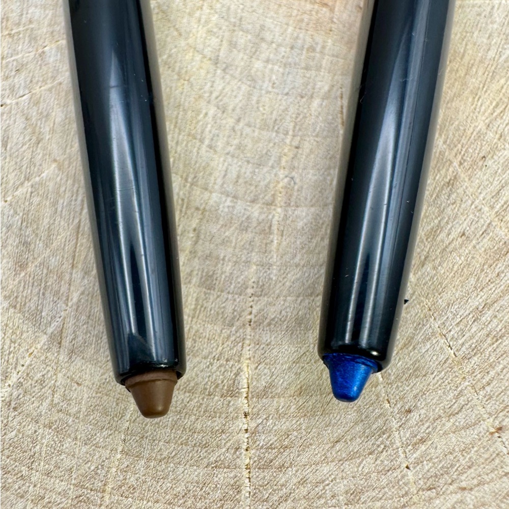 2 retractable eyeliners - cobalt blue and chestnut brown with built in sharpener